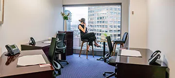 Servcorp client in a serviced office at 10 Avenue Kléber enjoying the premium workspace and stunning city views.